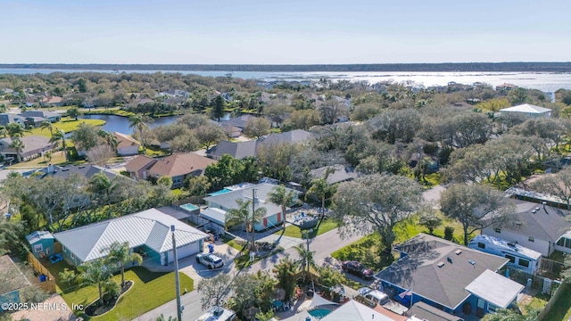 aerial view featuring a residential view and a water view