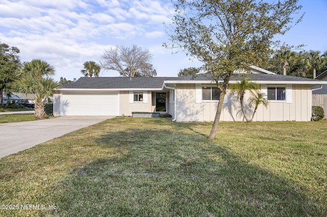 ranch-style house with a garage, driveway, and a front lawn