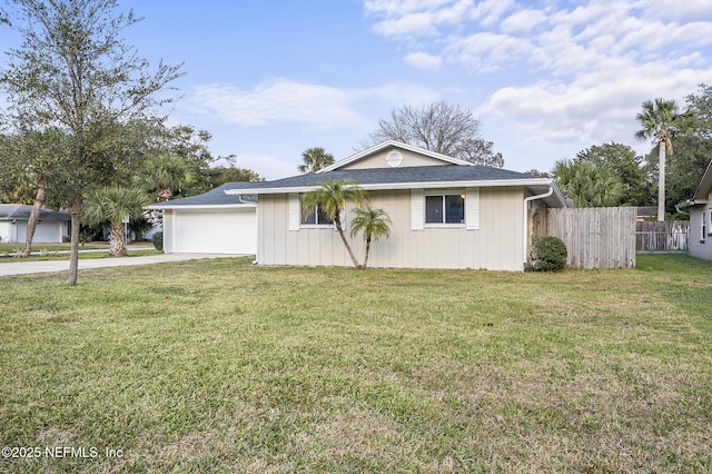 single story home featuring a front yard, fence, and a garage