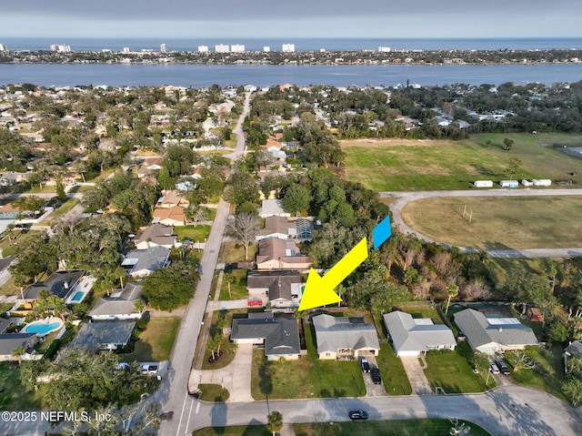 aerial view with a residential view and a water view