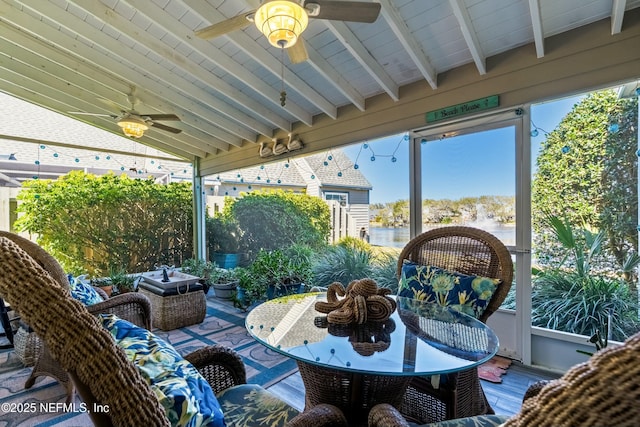 view of patio featuring ceiling fan and outdoor dining space