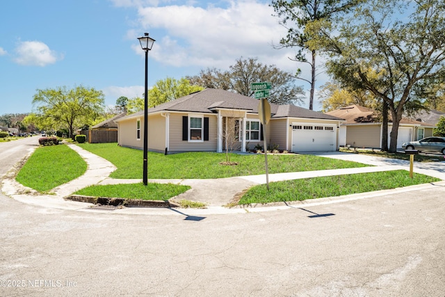 single story home with a garage, concrete driveway, a front lawn, and fence