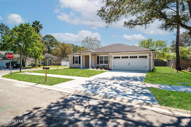 ranch-style house with an attached garage, driveway, a front lawn, and fence