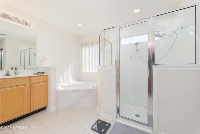 full bath featuring vanity, tile patterned floors, a bath, and a stall shower