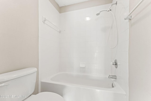 full bathroom featuring toilet and shower / washtub combination