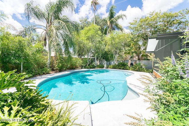 view of swimming pool with a fenced in pool and a fenced backyard