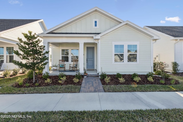 view of front of house with a porch and board and batten siding