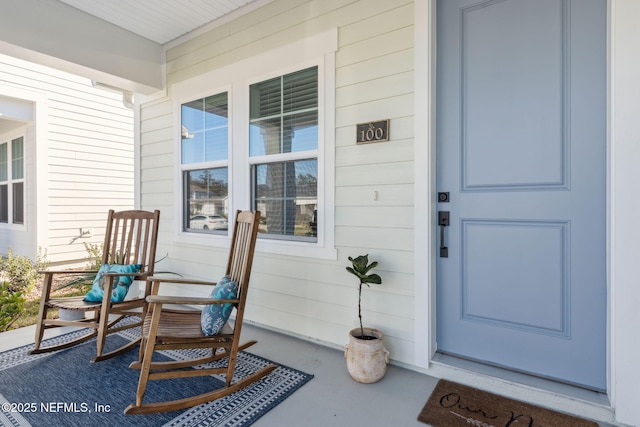 doorway to property with a porch