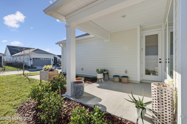 view of patio / terrace with a garage