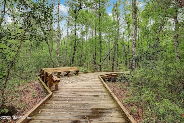 exterior space with a forest view