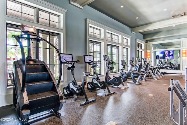 exercise room with french doors, recessed lighting, visible vents, and a healthy amount of sunlight