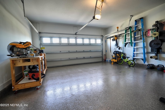 garage featuring a garage door opener