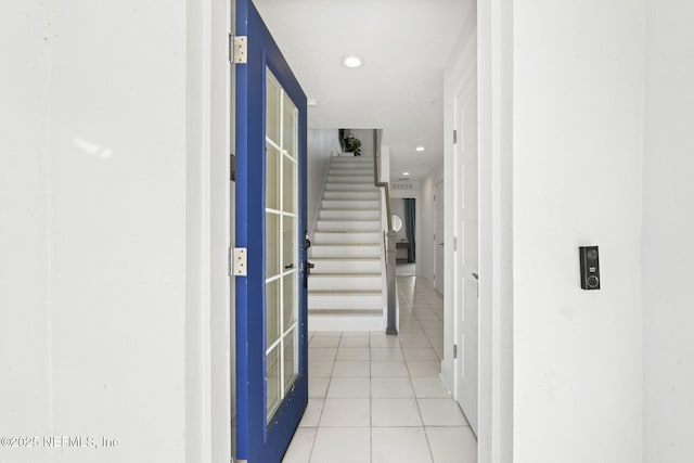 2072 Gail Ave, Jacksonville Beach, FL 32250 - hallway featuring tile patterned floors, stairway, and recessed lighting