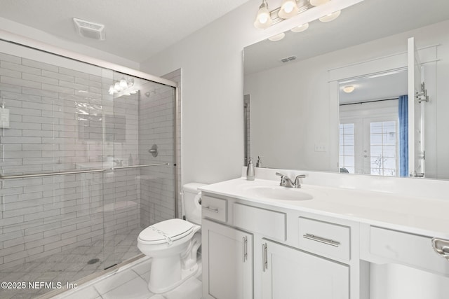 2072 Gail Ave, Jacksonville Beach, FL 32250 - full bath with visible vents, a shower stall, toilet, and vanity