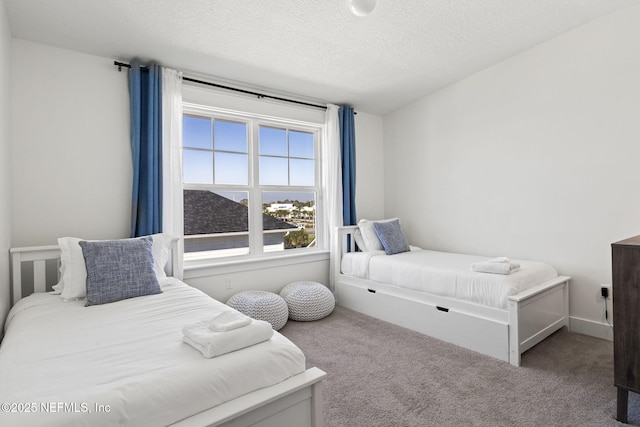 2072 Gail Ave, Jacksonville Beach, FL 32250 - carpeted bedroom with a textured ceiling