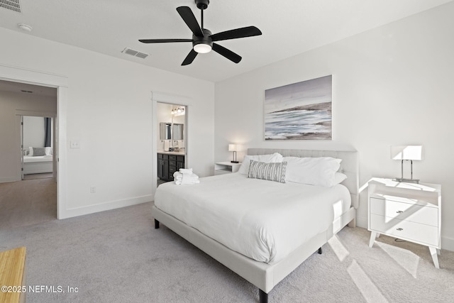 2072 Gail Ave, Jacksonville Beach, FL 32250 - carpeted bedroom featuring visible vents, ceiling fan, ensuite bathroom, and baseboards
