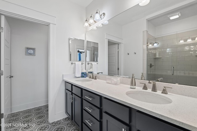 2072 Gail Ave, Jacksonville Beach, FL 32250 - bathroom with a sink, a stall shower, double vanity, and tile patterned floors