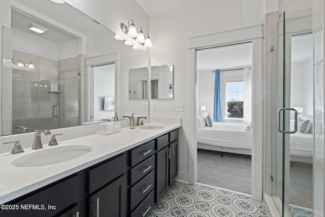 2072 Gail Ave, Jacksonville Beach, FL 32250 - ensuite bathroom with double vanity, a stall shower, ensuite bathroom, and a sink