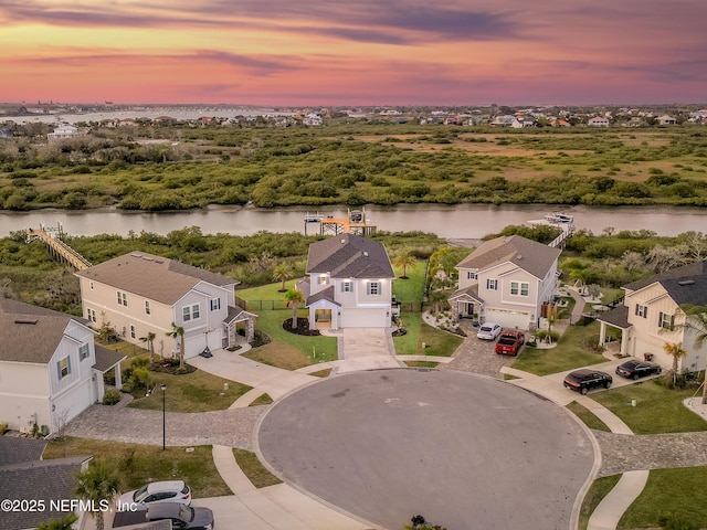 367 Five Island Dr, Saint Augustine, FL 32080 - aerial view at dusk featuring a water view and a residential view