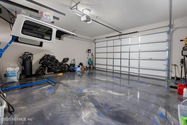 367 Five Island Dr, Saint Augustine, FL 32080 - garage with a garage door opener