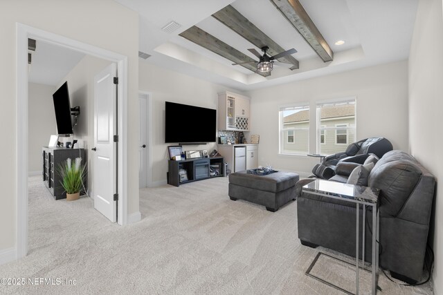 367 Five Island Dr, Saint Augustine, FL 32080 - living area featuring a ceiling fan, visible vents, light carpet, a raised ceiling, and baseboards