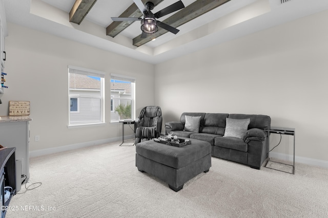 367 Five Island Dr, Saint Augustine, FL 32080 - living area featuring light carpet, baseboards, beam ceiling, and ceiling fan