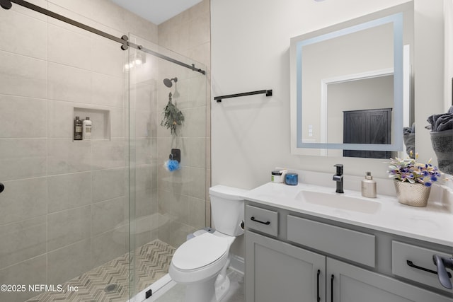 367 Five Island Dr, Saint Augustine, FL 32080 - bathroom featuring toilet, a shower stall, and vanity