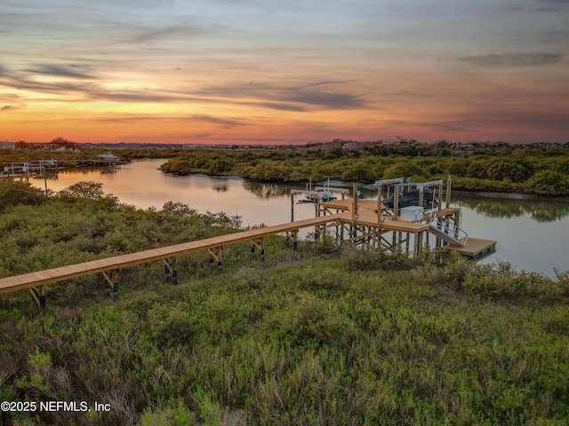 367 Five Island Dr, Saint Augustine, FL 32080 - dock area featuring boat lift and a water view