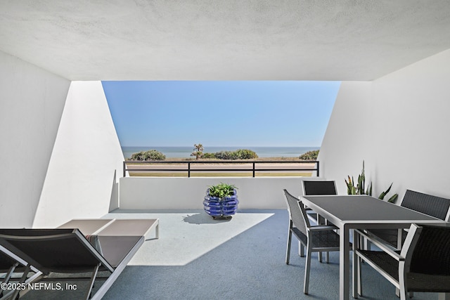 balcony with outdoor dining area