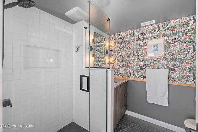 full bathroom featuring visible vents, a shower stall, baseboards, tile patterned floors, and vanity