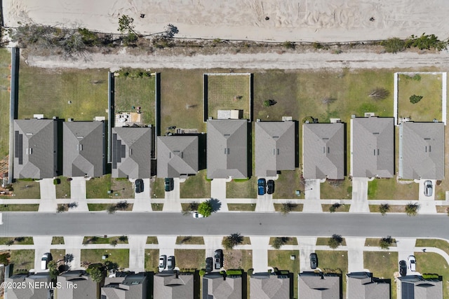 drone / aerial view with a residential view