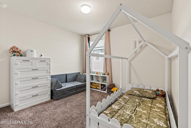 carpeted bedroom with a textured ceiling