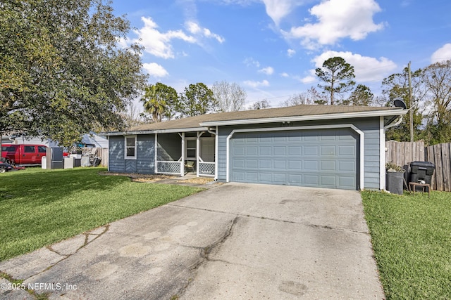 ranch-style house with driveway, an attached garage, a front lawn, and fence