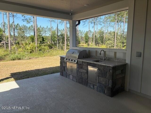 view of patio featuring a sink, grilling area, and area for grilling