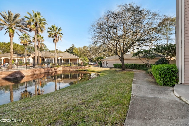 water view featuring fence