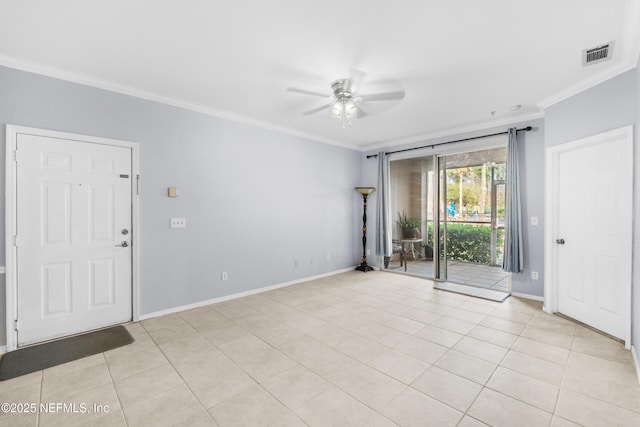 unfurnished room with light tile patterned floors, visible vents, and crown molding