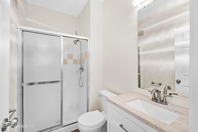 full bath with toilet, a stall shower, and vanity
