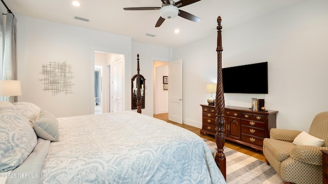 bedroom featuring visible vents, recessed lighting, a ceiling fan, and light wood-style floors