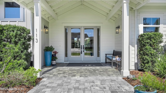 entrance to property featuring french doors