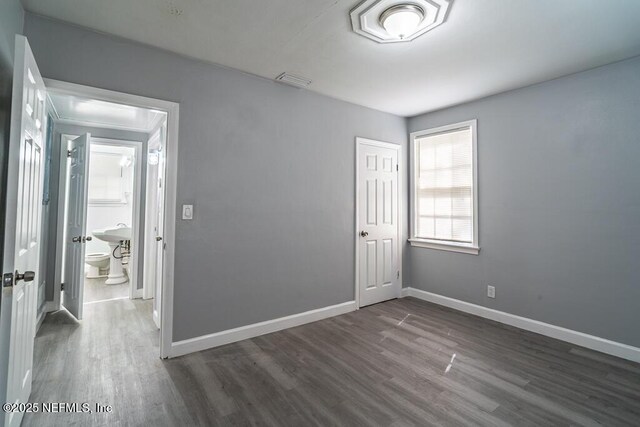 8027 Floyd St, Jacksonville, FL 32208 - spare room with visible vents, baseboards, and wood finished floors
