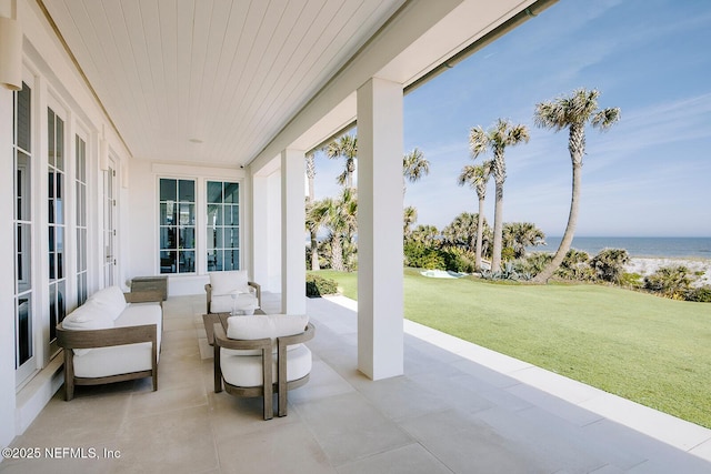 view of patio / terrace featuring a water view