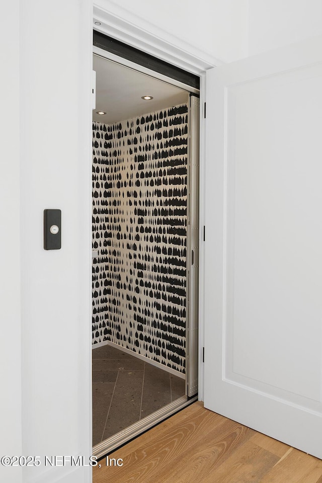 bathroom featuring wood finished floors