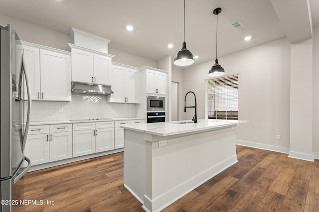 kitchen featuring visible vents, decorative backsplash, under cabinet range hood, black appliances, and white cabinetry