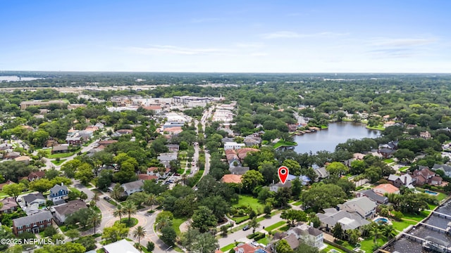 birds eye view of property with a water view and a residential view