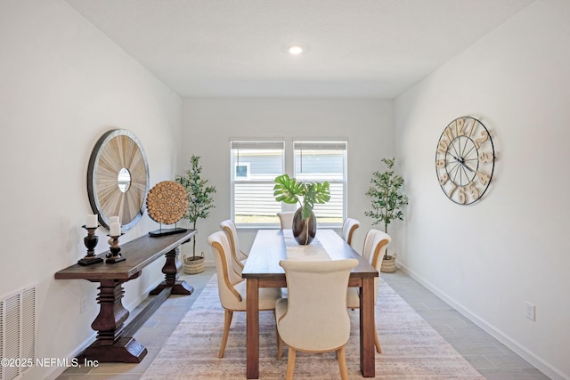 dining space featuring recessed lighting, wood finished floors, visible vents, and baseboards