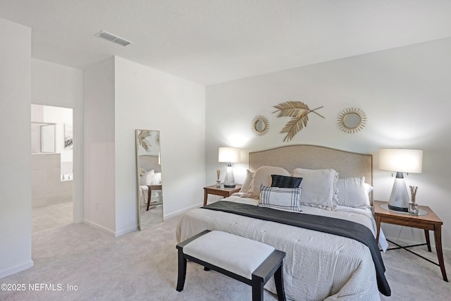 bedroom with visible vents, baseboards, and carpet