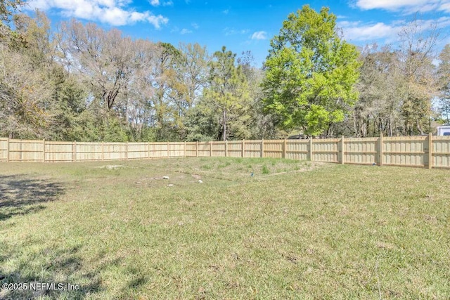 view of yard with fence