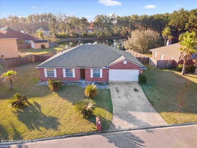 single story home featuring concrete driveway, brick siding, a front yard, and fence