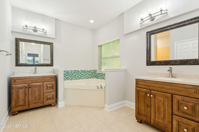 full bathroom with tile patterned flooring, a bath, two vanities, and a sink