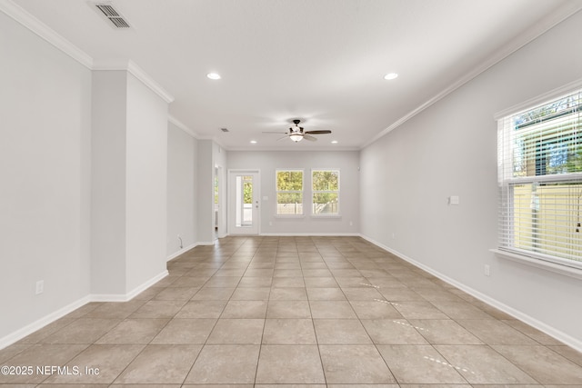 unfurnished room with plenty of natural light, visible vents, and baseboards